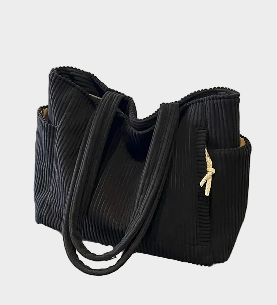 Knitted Shoulder Bag with Intricate Rope Knot and Modern Hue
