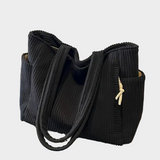 Knitted Shoulder Bag with Intricate Rope Knot and Modern Hue