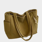 Knitted Shoulder Bag with Intricate Rope Knot and Modern Hue