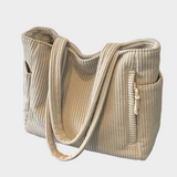 Knitted Shoulder Bag with Intricate Rope Knot and Modern Hue