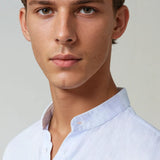 Light blue linen shirt with a stand-up collar