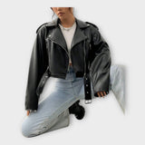 Short leather jacket with a belt