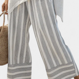 Daisy Set with Asymmetrical T-Shirt and Striped Trousers for a Modern and Elegant Style